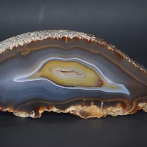 A close up of the side of an agate slice