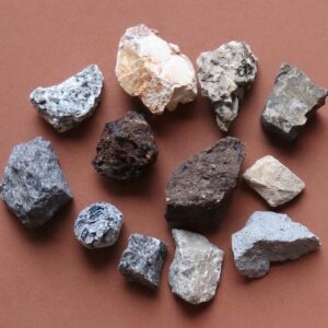 A group of rocks that are on the ground.