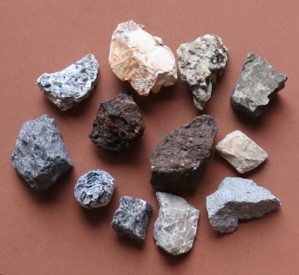 A group of rocks that are on the ground.