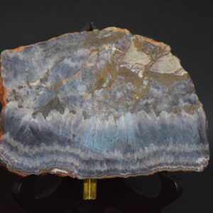 A slab of blue agate on display in a museum.