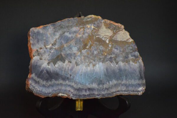 A slab of blue agate on display in a museum.